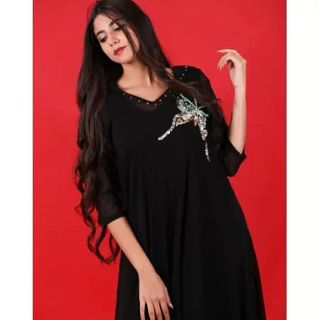 Biyadina Two-piece black djellaba with pearls Biyadina Store
